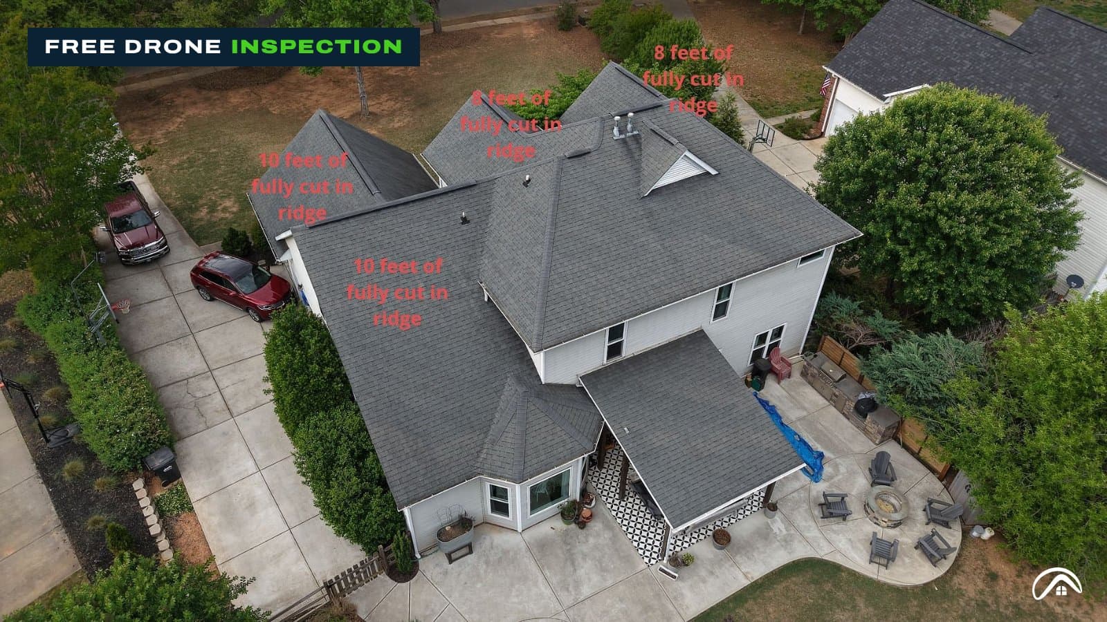 Drone photo of a Charlotte home's roof with ridge vent lengths marked on each section during a free inspection