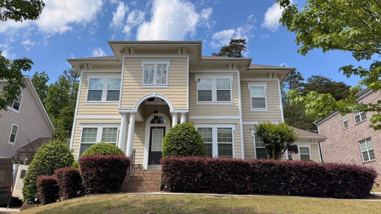 Restored Charlotte home exterior with new windows